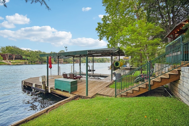 view of dock featuring a water view and a lawn