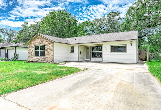 ranch-style house with a front yard