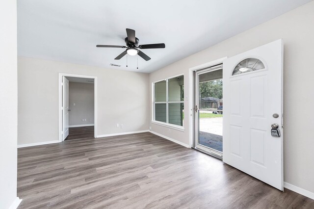 entryway featuring wood-type flooring and ceiling fan