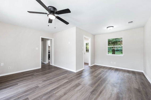 spare room featuring hardwood / wood-style floors and ceiling fan