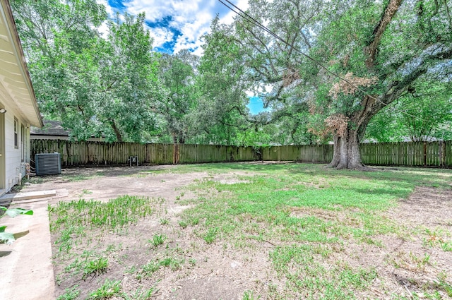 view of yard with central AC