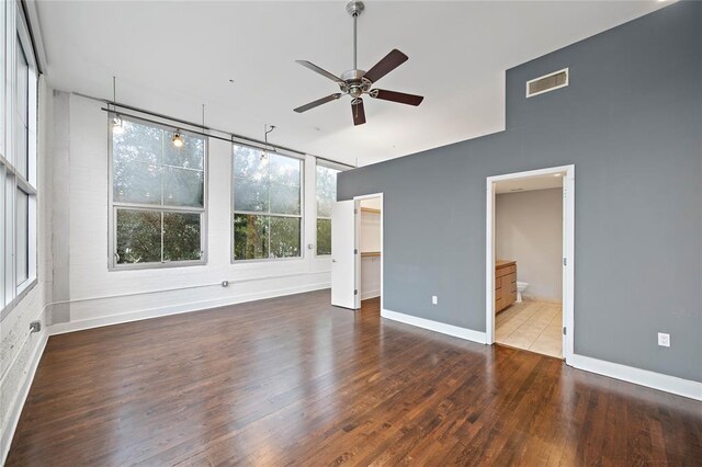 interior space with ceiling fan and hardwood / wood-style floors