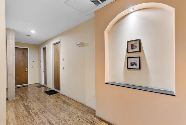 hall featuring light hardwood / wood-style flooring