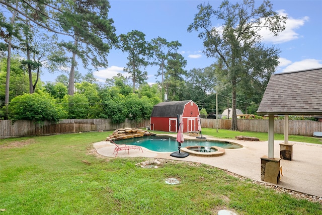 view of swimming pool with a patio, a shed, and a yard