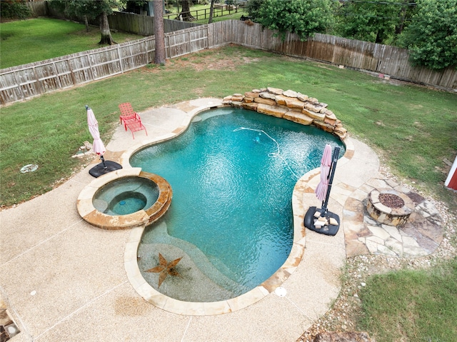 view of pool with a patio, an in ground hot tub, and a yard