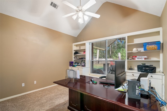 carpeted office space with ceiling fan and high vaulted ceiling