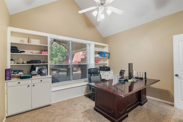 carpeted office space with high vaulted ceiling and ceiling fan