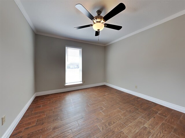 empty room with ornamental molding, dark hardwood / wood-style floors, and ceiling fan