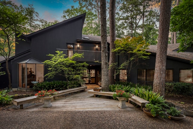 view of front of house with a wooden deck