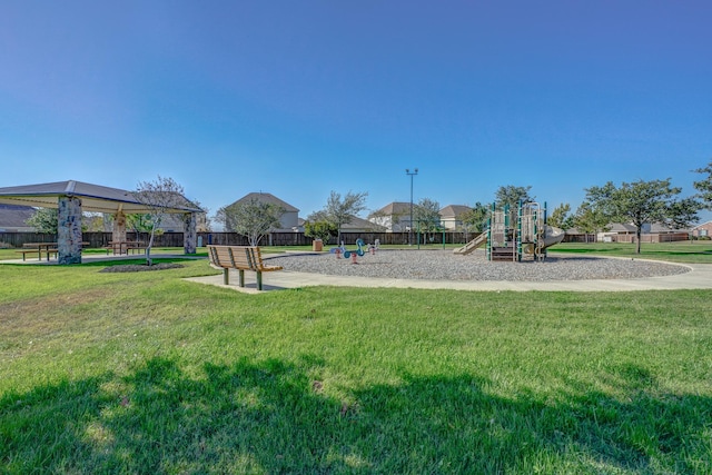 view of playground with a gazebo and a yard