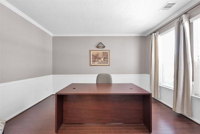 unfurnished office featuring crown molding and dark wood-type flooring