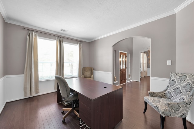 office area with a textured ceiling, crown molding, and dark hardwood / wood-style floors