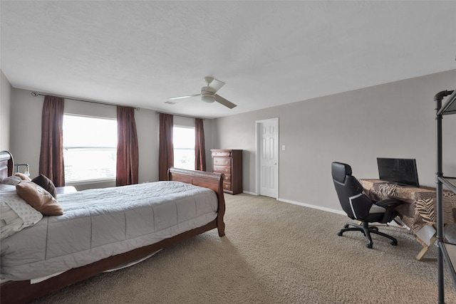 bedroom with light carpet and ceiling fan