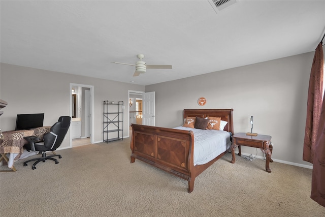 carpeted bedroom featuring connected bathroom and ceiling fan