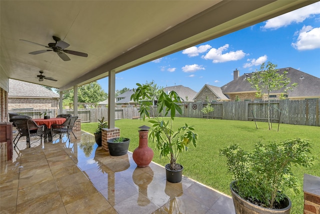 view of patio / terrace featuring ceiling fan