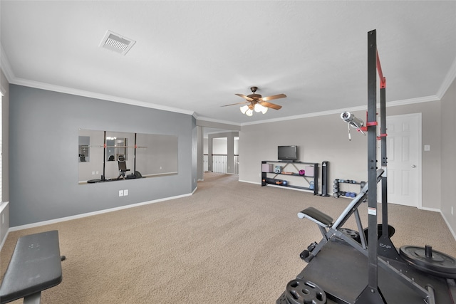 workout room featuring carpet, ornamental molding, and ceiling fan