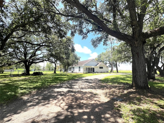 view of front of home featuring a front yard