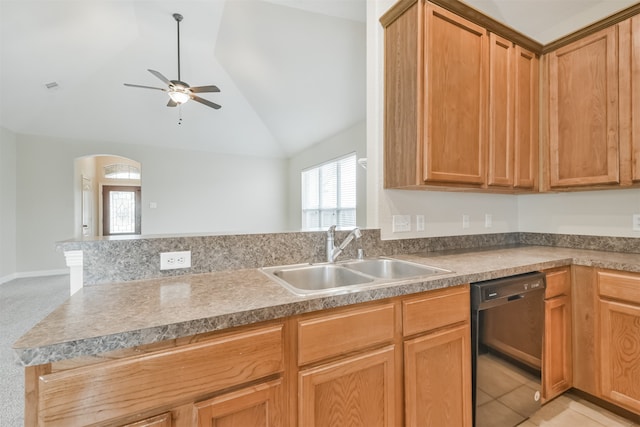 kitchen featuring light carpet, lofted ceiling, dishwasher, ceiling fan, and sink