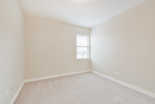 empty room featuring carpet flooring