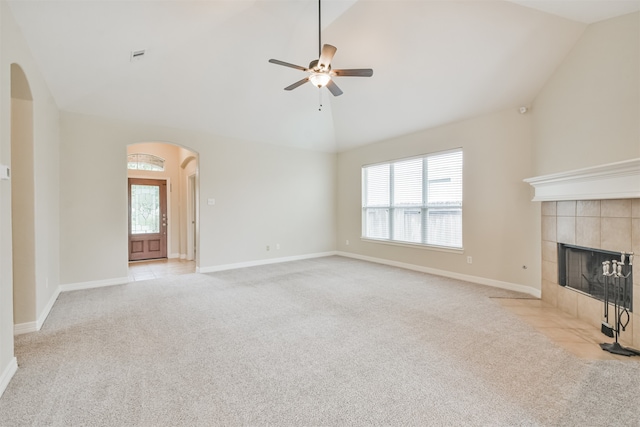 unfurnished living room with light carpet and a healthy amount of sunlight