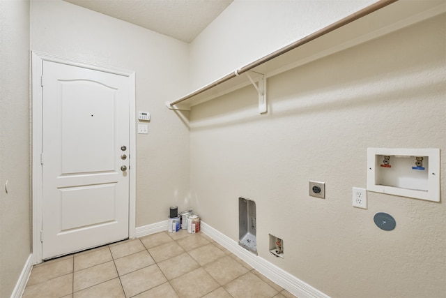 washroom with light tile patterned floors, washer hookup, and electric dryer hookup