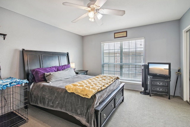 bedroom with ceiling fan and carpet