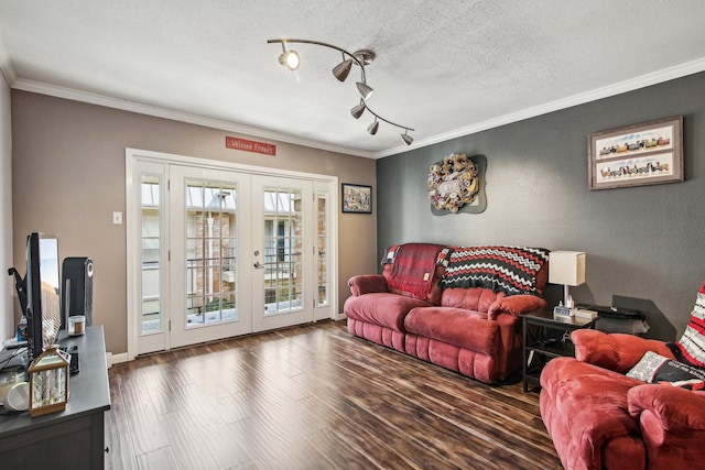 living room featuring rail lighting, french doors, crown molding, a textured ceiling, and hardwood / wood-style flooring