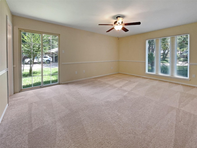 15215 Benfer Rd, Houston, TX 77069 - carpeted empty room with a wealth of natural light and ceiling fan