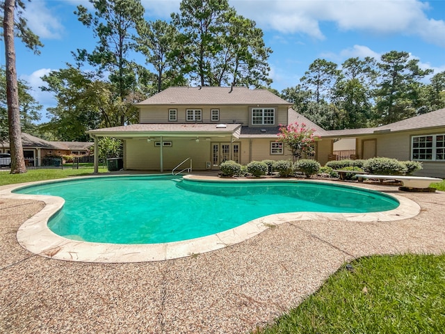 view of swimming pool featuring a patio area