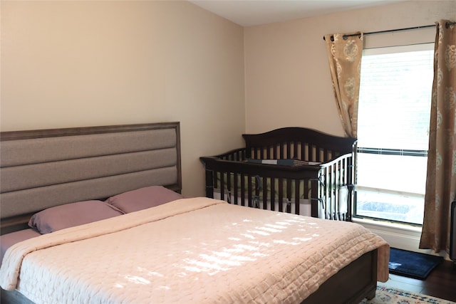 bedroom featuring hardwood / wood-style flooring