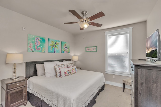 bedroom with light carpet and ceiling fan