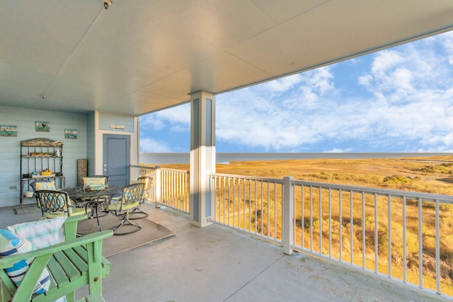 view of patio / terrace with a balcony