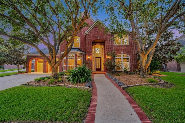 view of front of home with a lawn