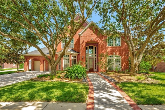 view of front of home with a front lawn