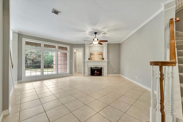 unfurnished living room featuring crown molding, light tile patterned floors, and ceiling fan