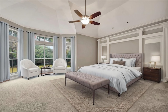 carpeted bedroom featuring ceiling fan and vaulted ceiling