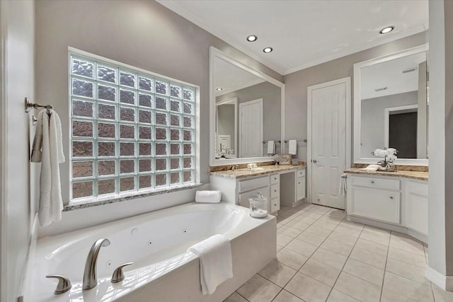 bathroom featuring vanity, a tub to relax in, ornamental molding, and tile patterned floors