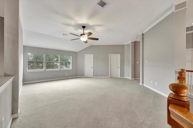 unfurnished living room featuring ceiling fan, lofted ceiling, carpet flooring, and ornamental molding