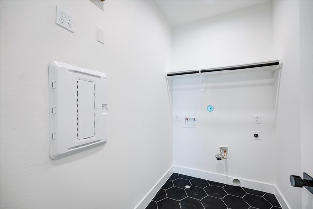 washroom with tile patterned flooring, gas dryer hookup, hookup for a washing machine, and electric dryer hookup