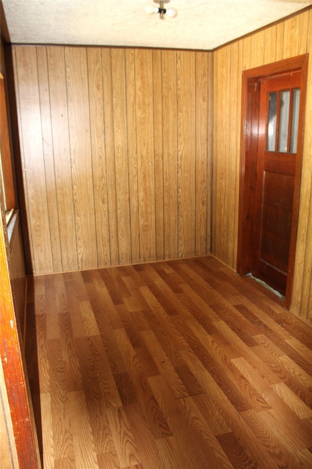 spare room with hardwood / wood-style flooring