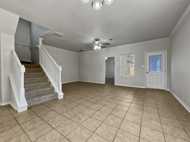 unfurnished living room featuring crown molding, ceiling fan, and light tile patterned floors