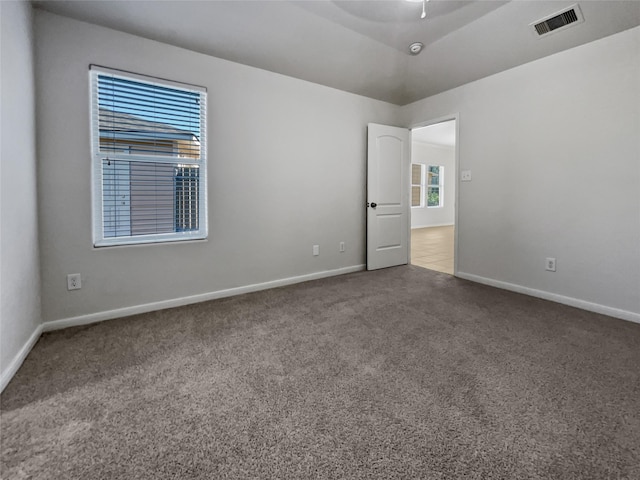 spare room featuring carpet flooring