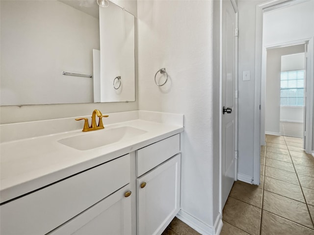 bathroom with vanity and tile patterned floors