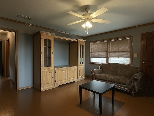 1634 Antoine Dr, Houston, TX 77055 - living room featuring visible vents, ornamental molding, baseboards, and ceiling fan