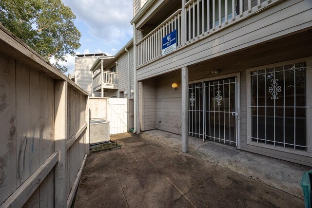 view of patio / terrace with a balcony