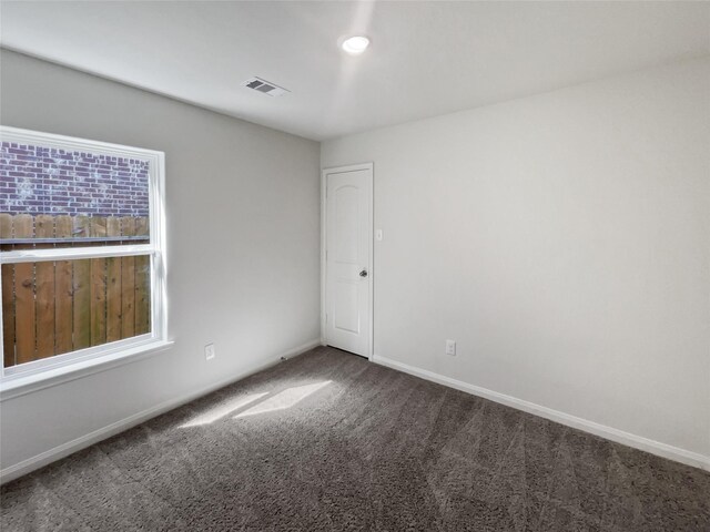 unfurnished room with carpet