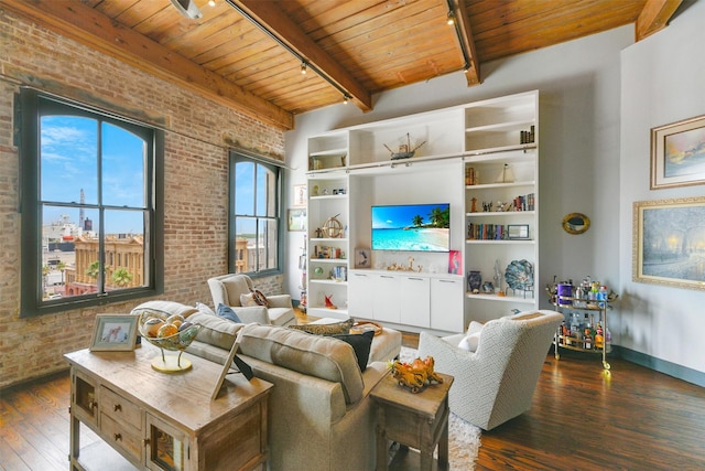 living room with track lighting, brick wall, wood ceiling, and dark wood-type flooring