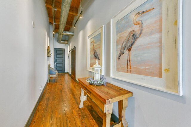 hallway featuring hardwood / wood-style flooring