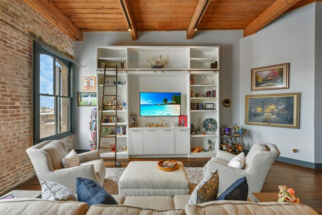 living room with hardwood / wood-style flooring, beamed ceiling, wooden ceiling, and brick wall