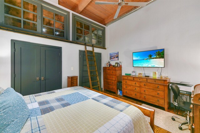 bedroom with hardwood / wood-style flooring, wooden ceiling, and lofted ceiling with beams